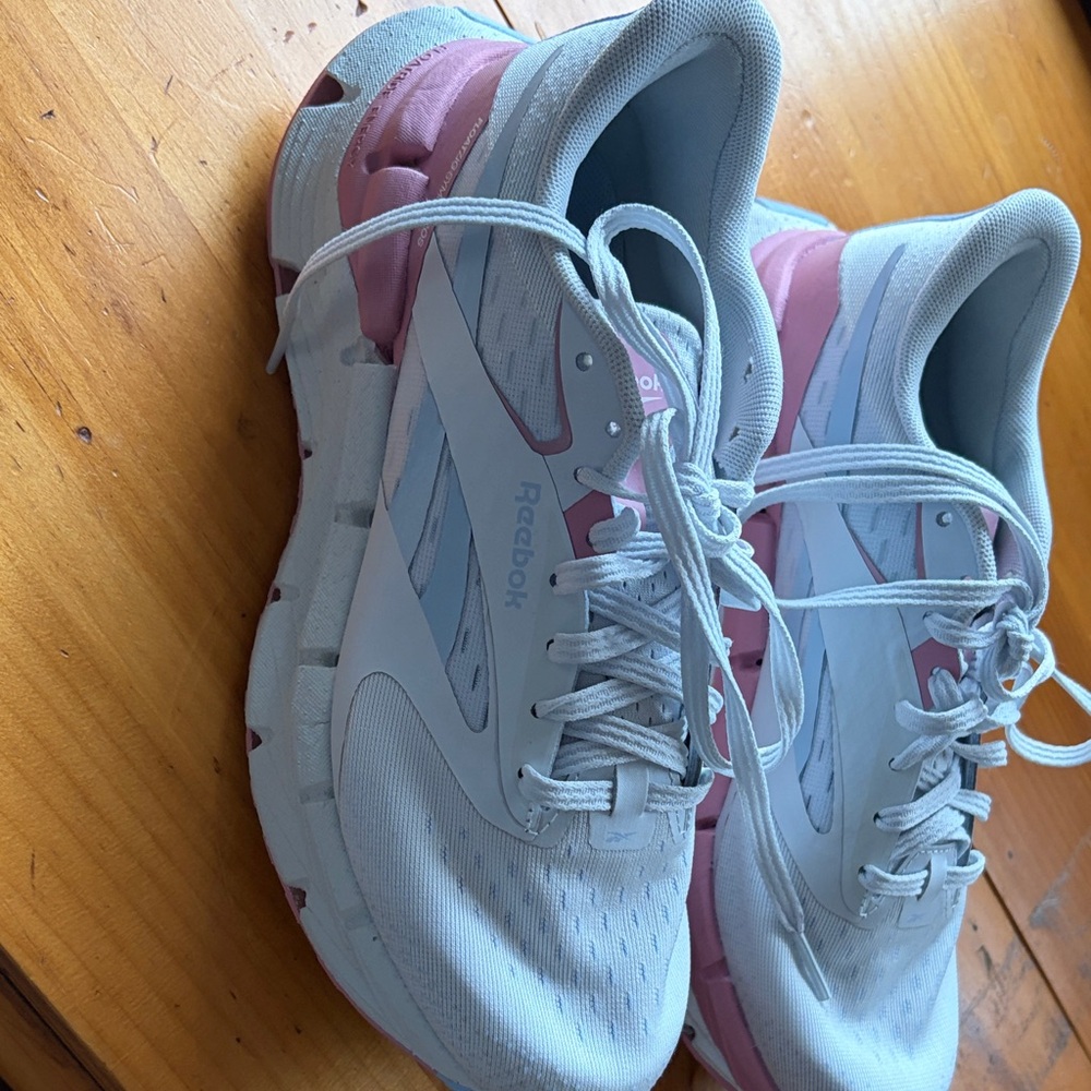 Reebok Women's Light Blue and Pink running shoes. Worn around house once.
